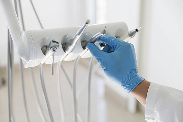 Professional Tooth Extraction technician working in Peachtree City, GA